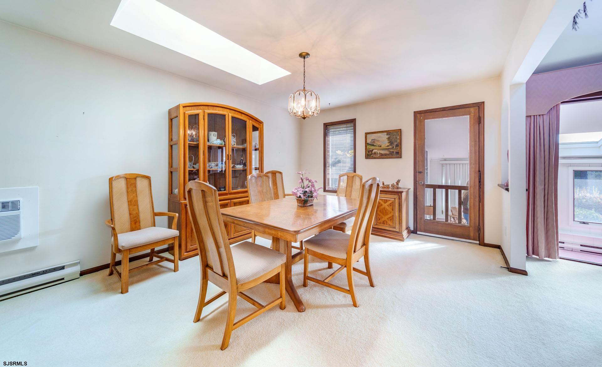 601 2nd Avenue Marmora, NJ 08223 - Photo 9 of 31 a dining room with furniture and window