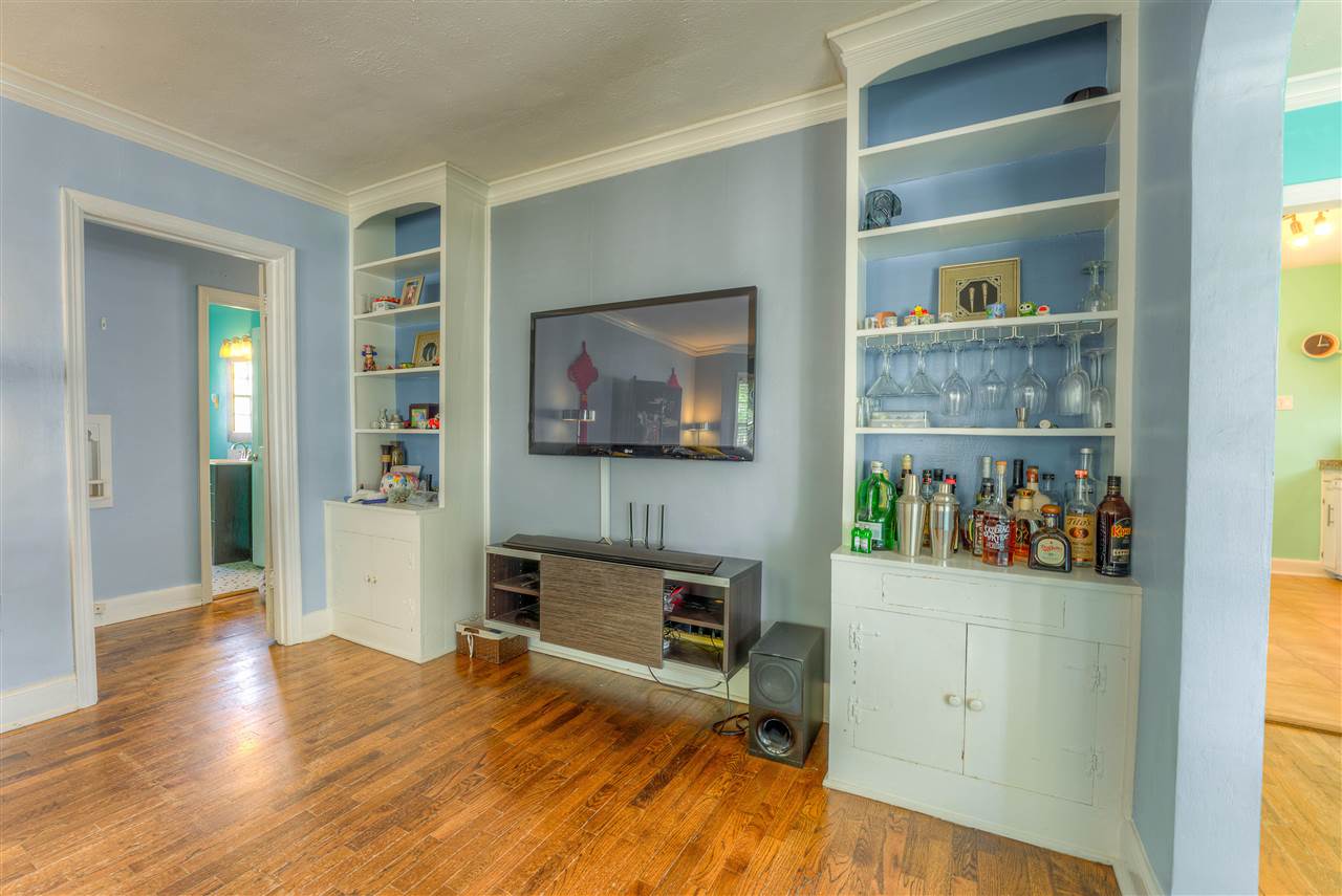 The other side of the living room that showcases nice built ins.
