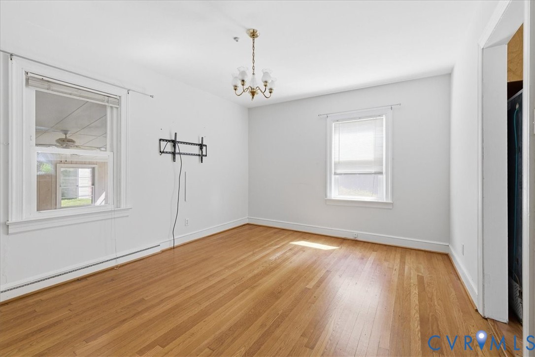 8100 Sandy Ridge Road Hopewell, VA 23860 - Photo 14 of 36 Room featuring hardwood flooring, white walls, and