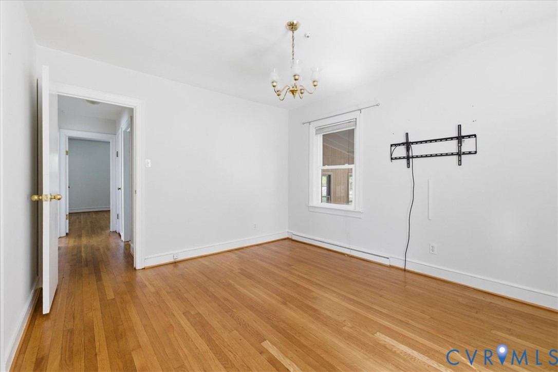8100 Sandy Ridge Road Hopewell, VA 23860 - Photo 15 of 36 Room featuring wood-finish flooring, a single wind