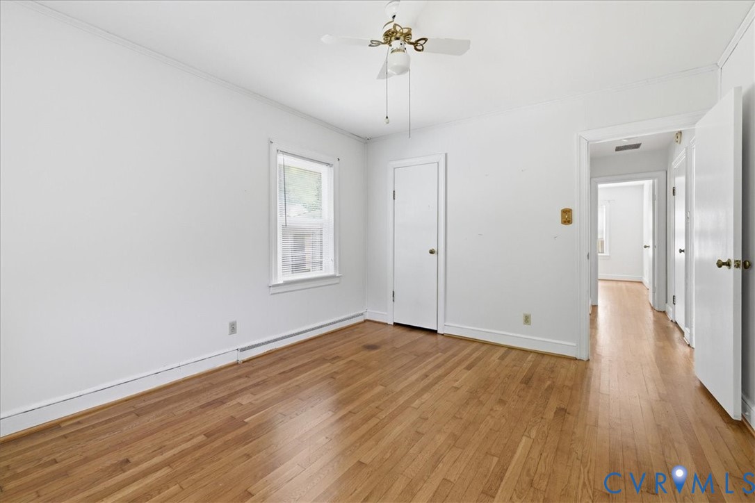 8100 Sandy Ridge Road Hopewell, VA 23860 - Photo 16 of 36 Interior room featuring wood-finish flooring, whit