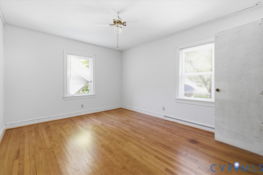 8100 Sandy Ridge Road Hopewell, VA 23860 - Photo 17 of 36 Room featuring wood-finish flooring, white walls,