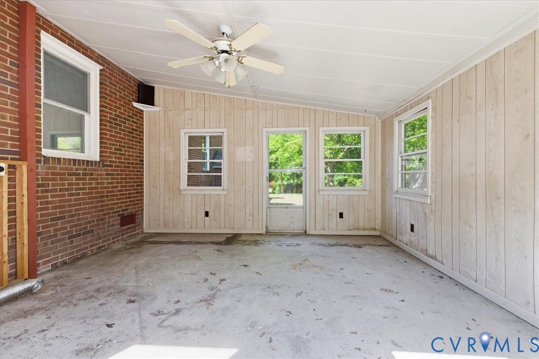8100 Sandy Ridge Road Hopewell, VA 23860 - Photo 21 of 36 Enclosed porch featuring a painted wood-plank ceil