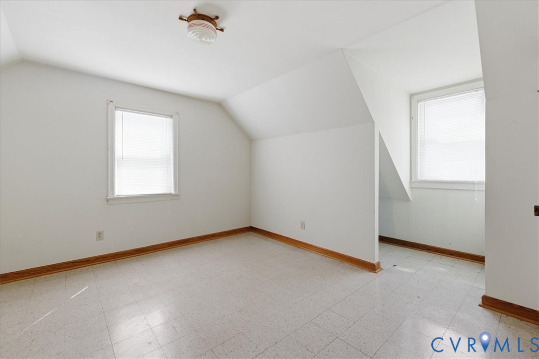 8100 Sandy Ridge Road Hopewell, VA 23860 - Photo 23 of 36 Attic space featuring sloped ceilings, two windows