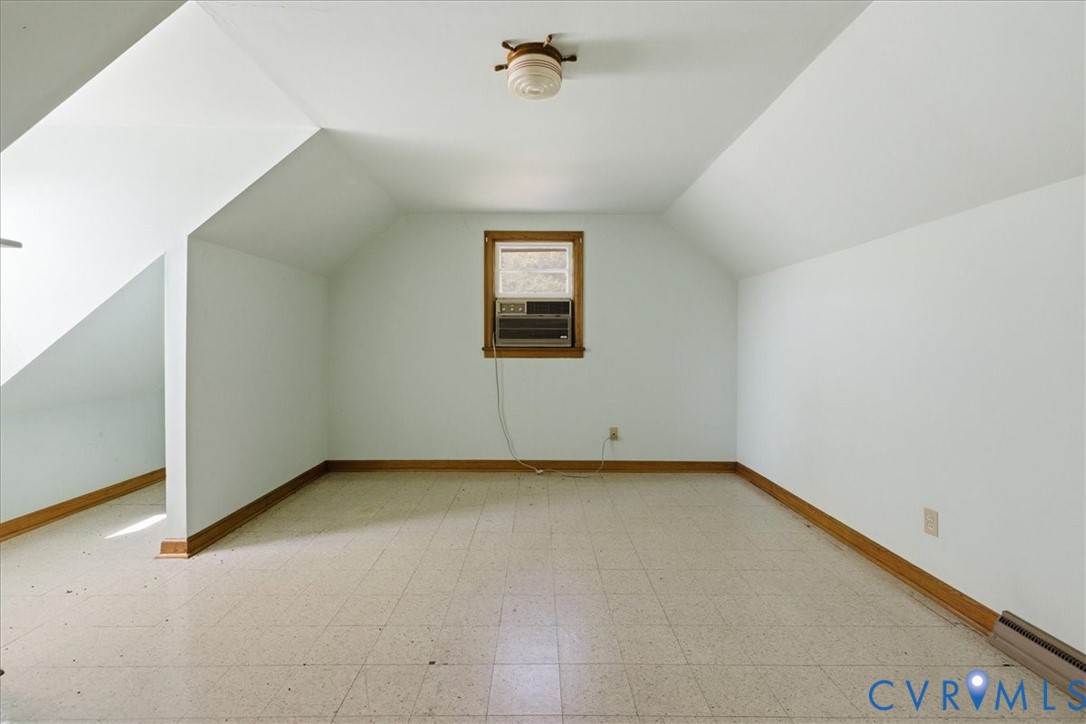 8100 Sandy Ridge Road Hopewell, VA 23860 - Photo 26 of 36 Attic space featuring sloped ceilings, a window wi