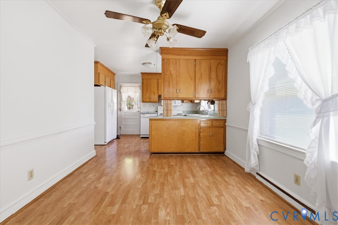 8100 Sandy Ridge Road Hopewell, VA 23860 - Photo 7 of 36 Kitchen space featuring wood-finish flooring, ligh