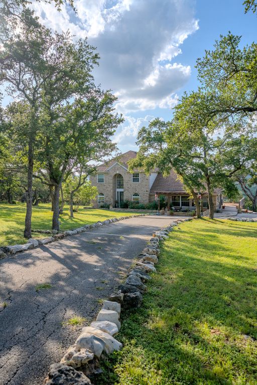 1950 Estrellita Ranch Road Canyon Lake, TX 78133 - Photo 13 of 34 a view of yard with swimming pool and green space