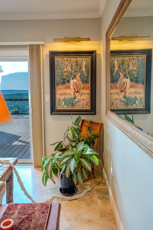 1950 Estrellita Ranch Road Canyon Lake, TX 78133 - Photo 32 of 34 a glass vase with flowers and with wooden floor