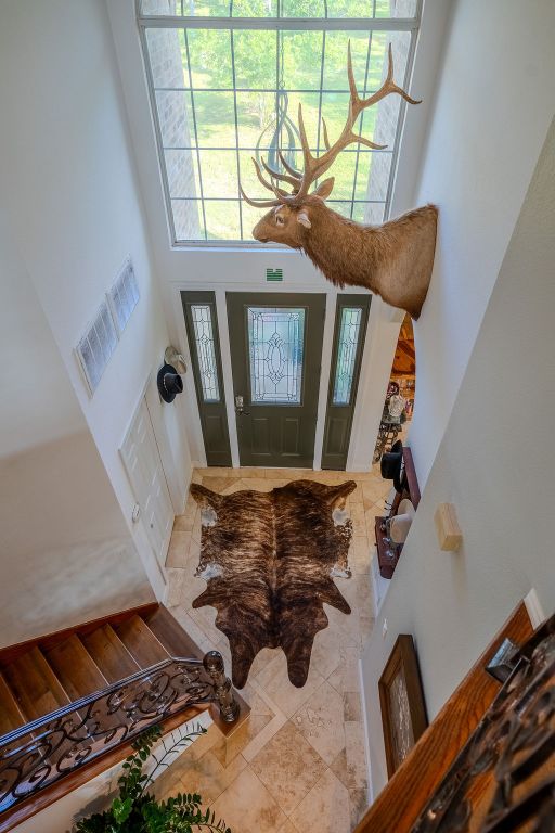 1950 Estrellita Ranch Road Canyon Lake, TX 78133 - Photo 33 of 34 a room with furniture and a window