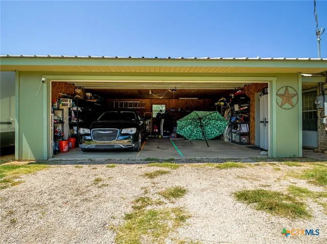 a view of a lake with a big yard