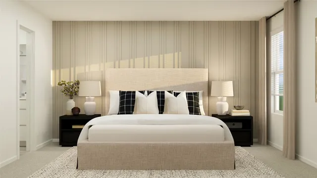 a bedroom with a bed and window