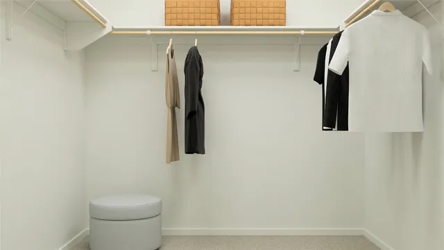 a bathroom with a toilet sink vanity and mirror