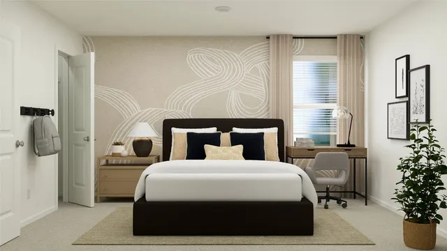 a bedroom with a bed and a potted plant