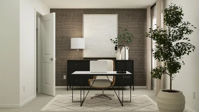 a view of a workspace with furniture