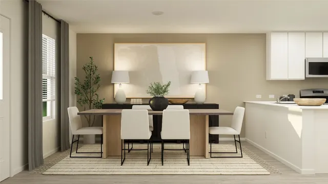 a dining room with furniture and window