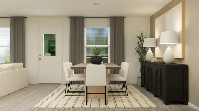 a dining room with furniture and wooden floor