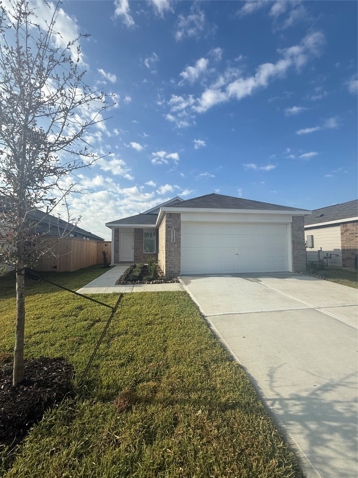 1739 West Stroker Road Crosby, TX 77532 - Photo 1 of 12 a house view with a backyard space
