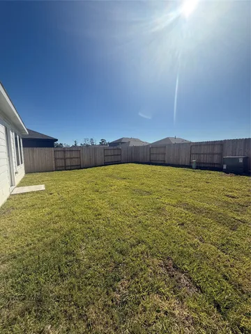 a view of a swimming pool and an outdoor space