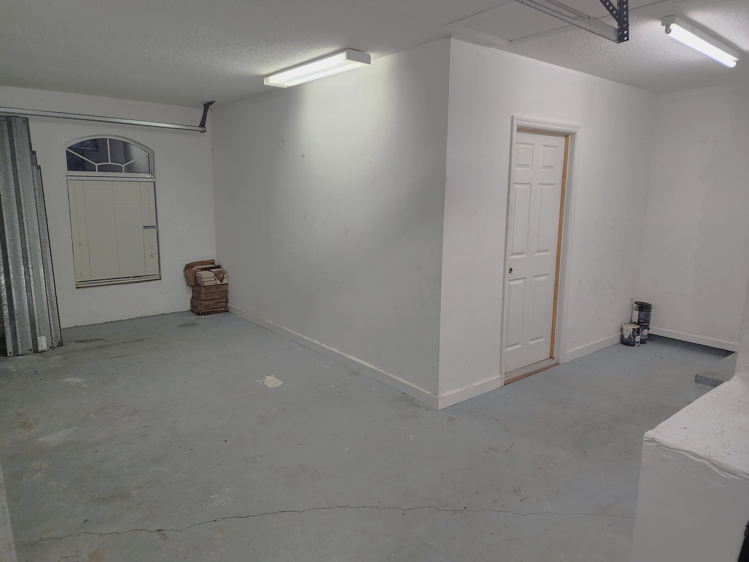 13426 85th Road North West Palm Beach, FL 33412 - Photo 18 of 21 Garage with AC'd room