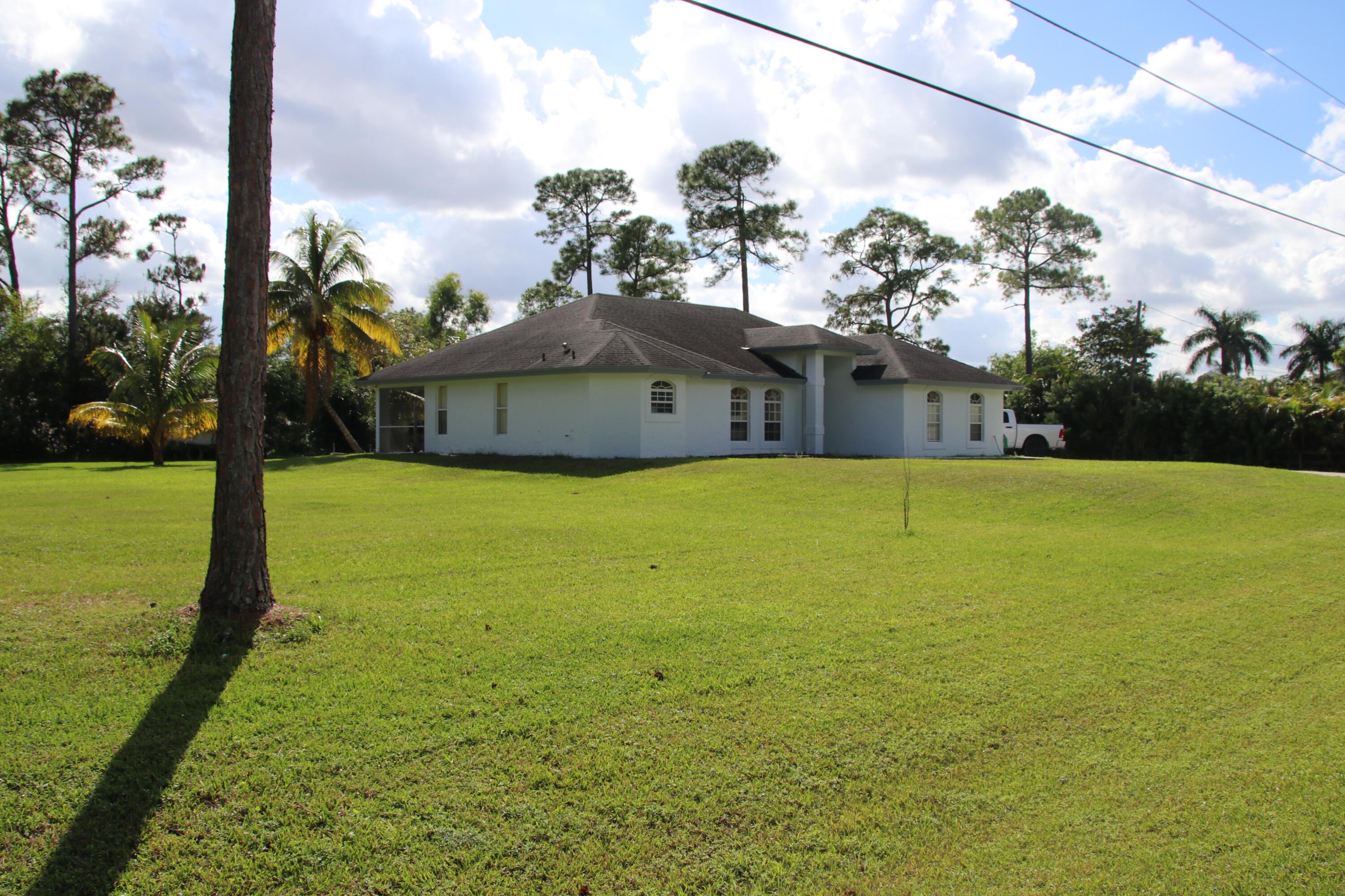 13426 85th Road North West Palm Beach, FL 33412 - Photo 2 of 21 East side of home