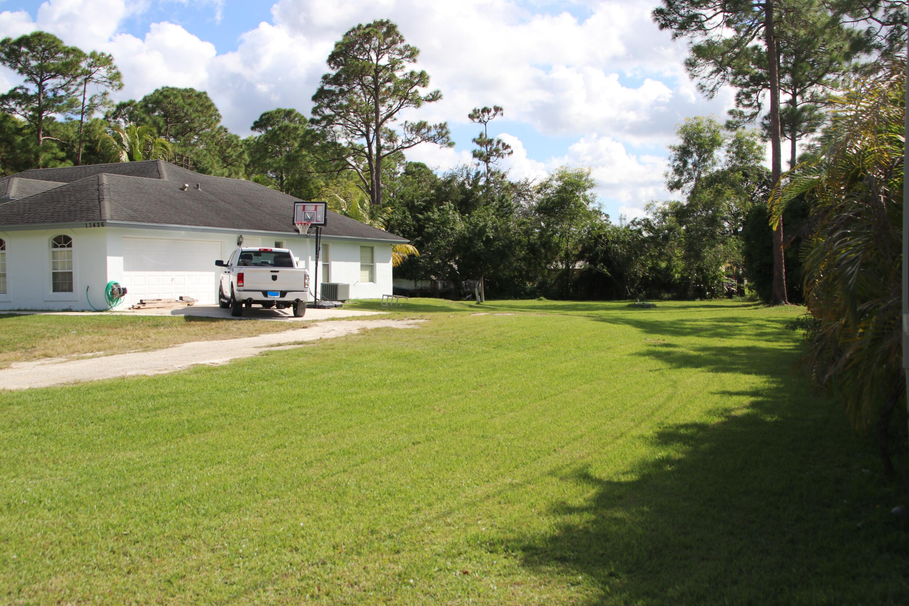 13426 85th Road North West Palm Beach, FL 33412 - Photo 3 of 21 Side garage