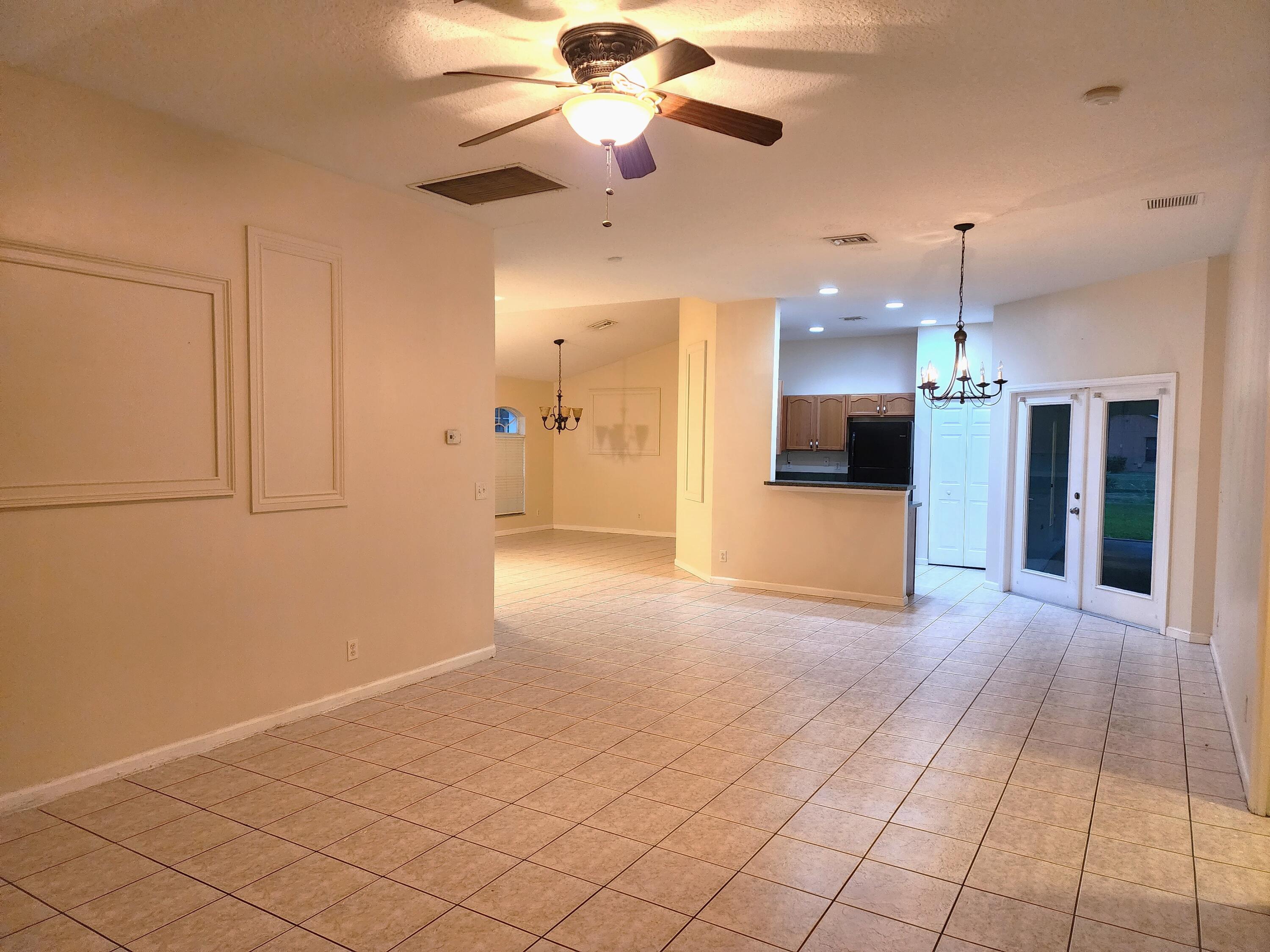 13426 85th Road North West Palm Beach, FL 33412 - Photo 7 of 21 Family room facing kitchen