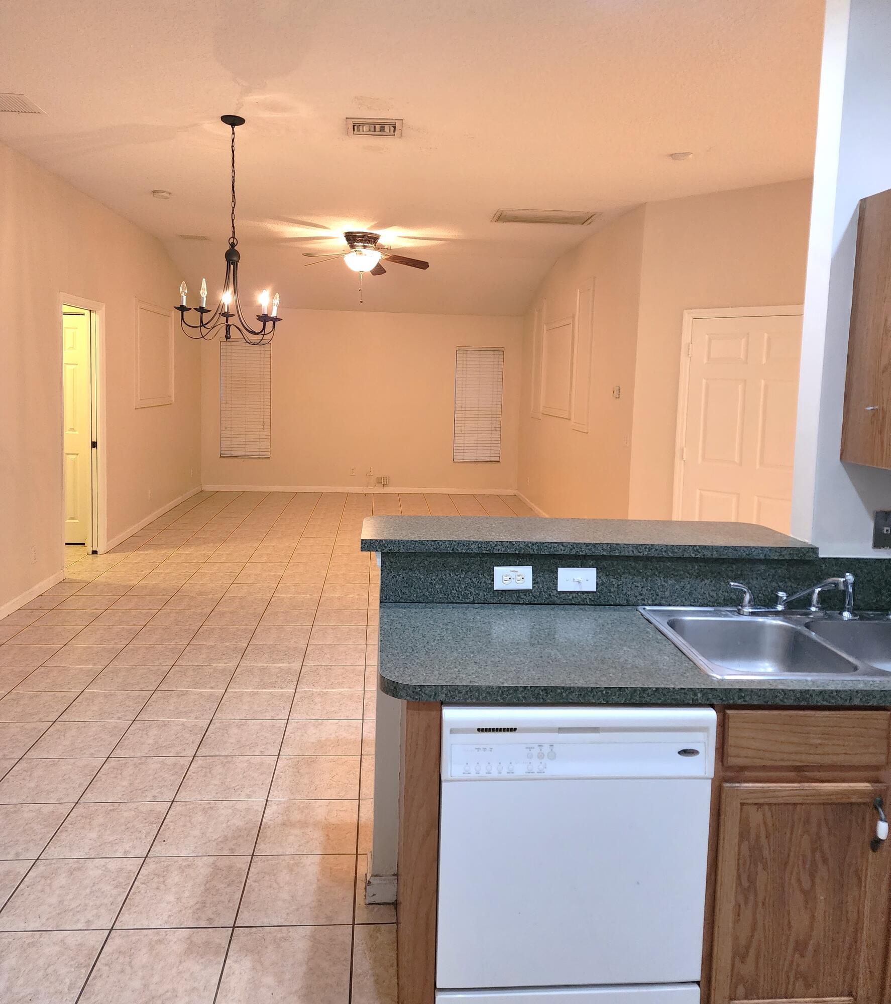 13426 85th Road North West Palm Beach, FL 33412 - Photo 9 of 21 kitchen overlooking family/dining