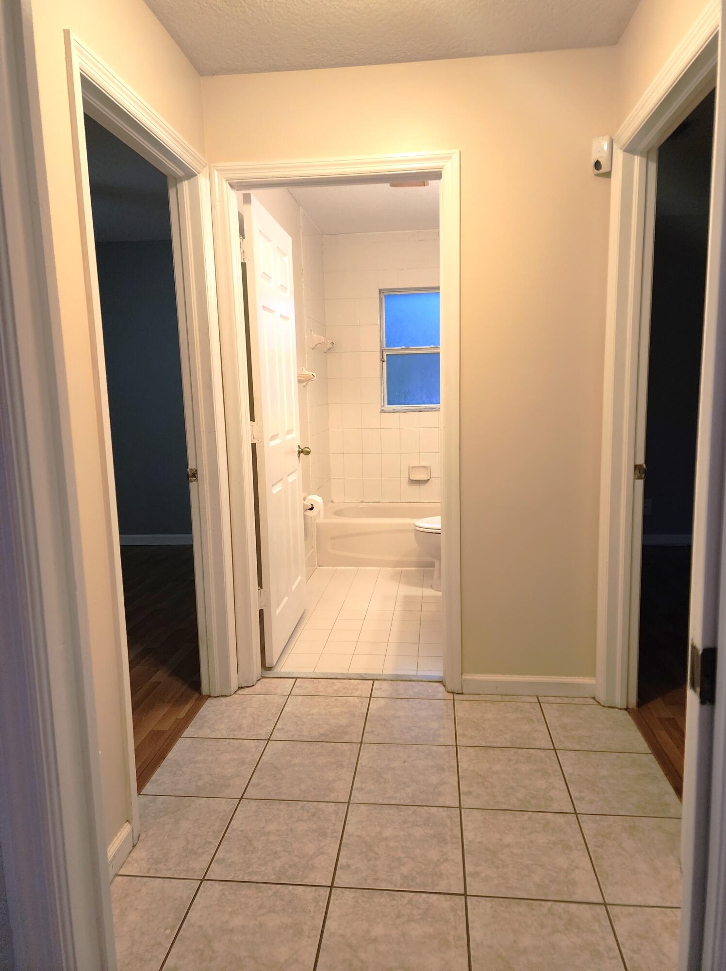 13426 85th Road North West Palm Beach, FL 33412 - Photo 10 of 21 guest room private hallway