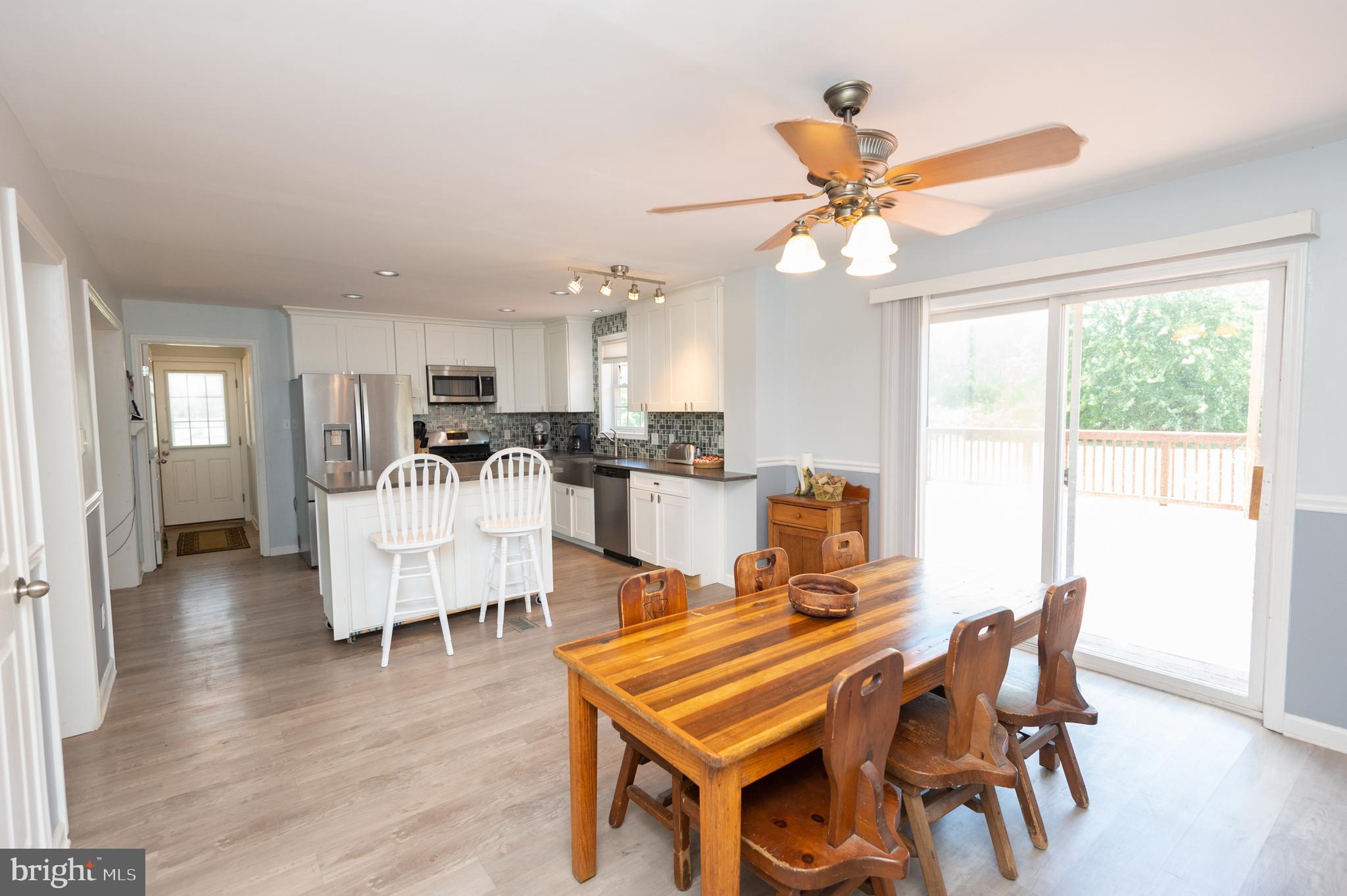 711 Twin Point Cove Road Cambridge, MD 21613 - Photo 9 of 45 Dining Room with View into Kitchen