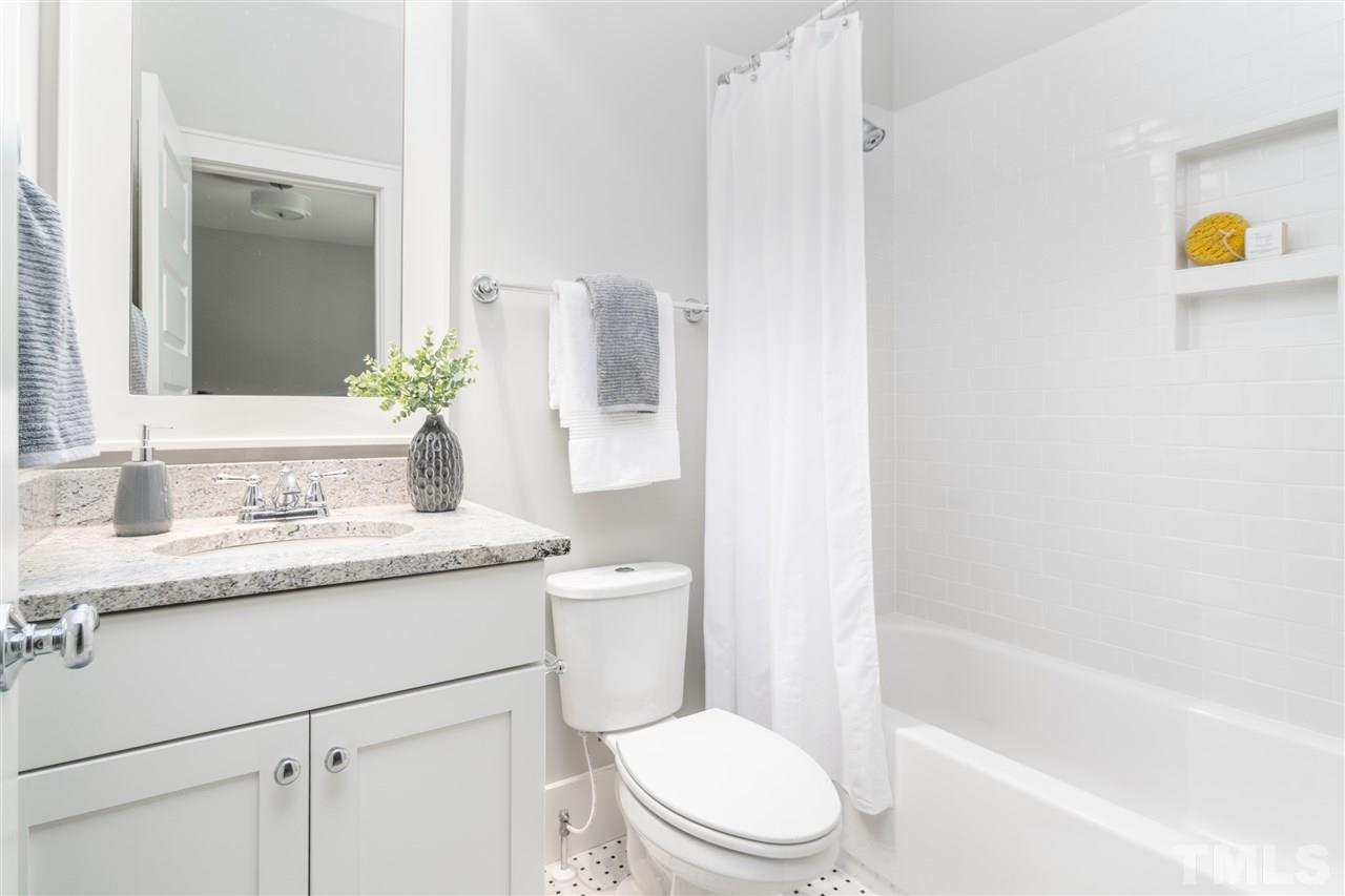 2324 Yancey Street Raleigh, NC 27608 - Photo 24 of 29 Bedroom 5's full en-suite bath.