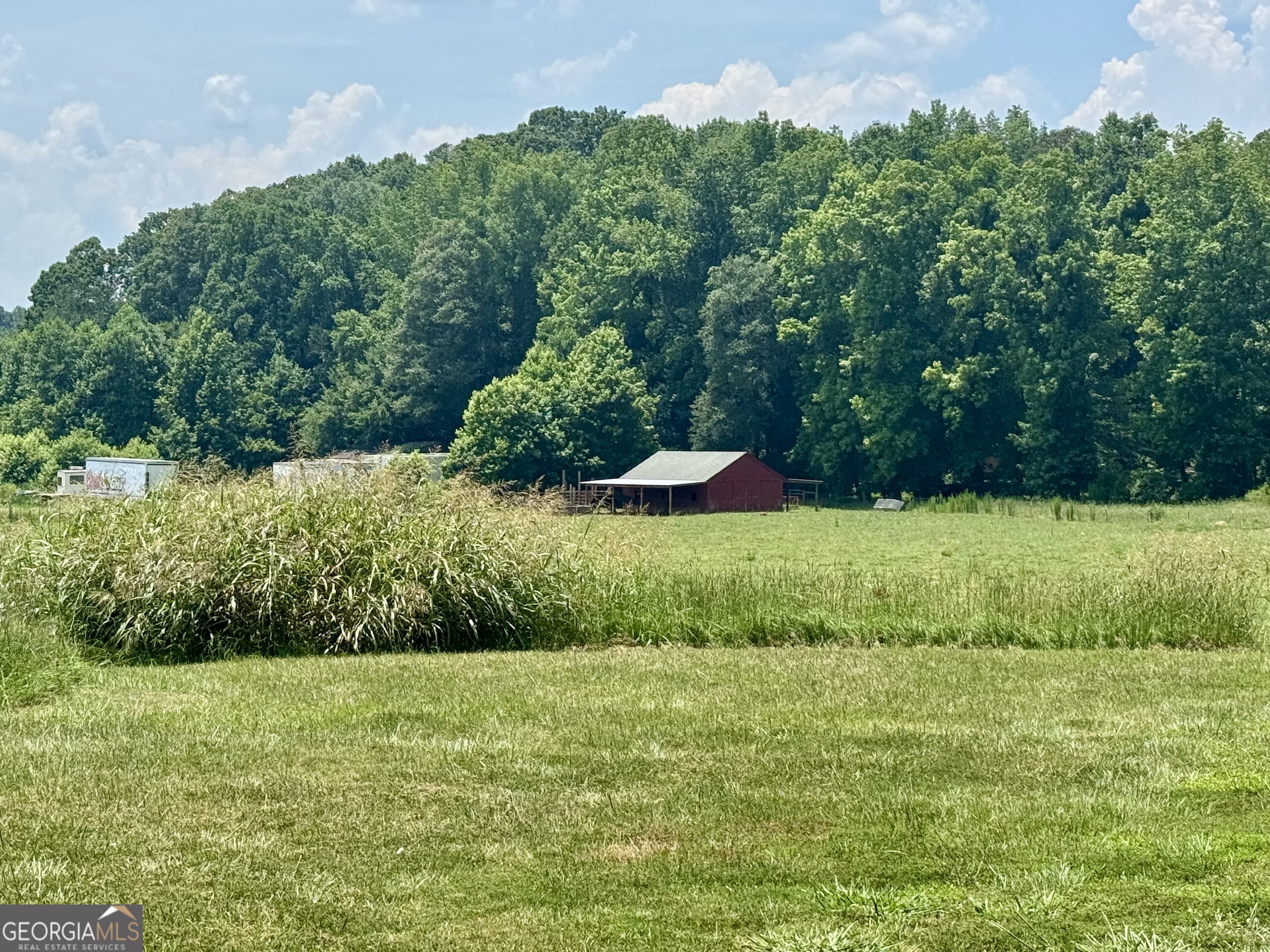 a view of an outdoor space and a yard