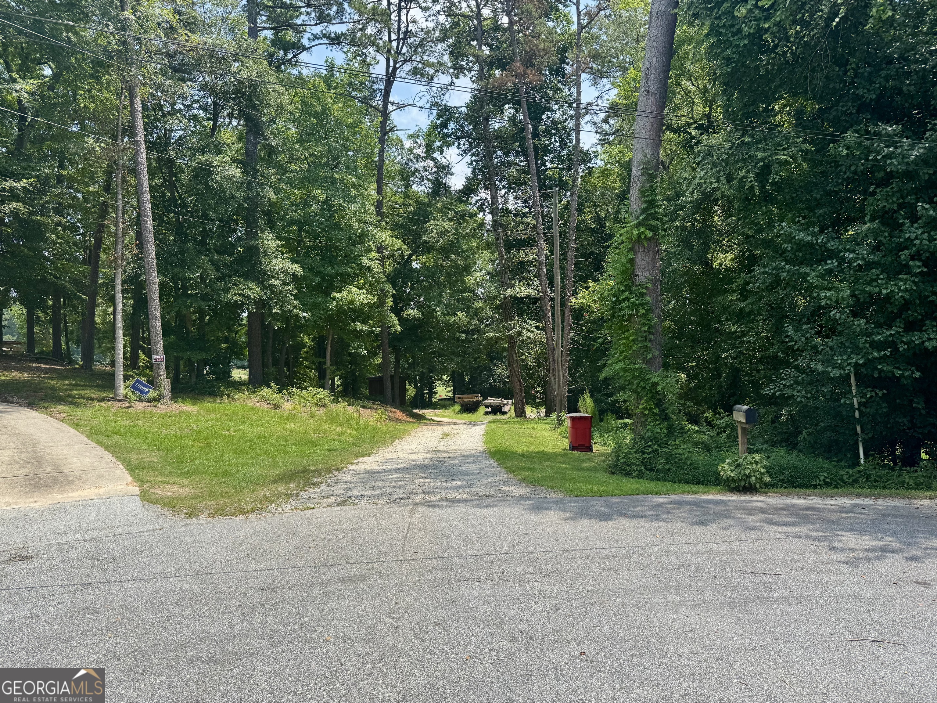 1148 Beaver Dam Road Hoschton, GA 30548 - Photo 2 of 11 a view of a park with large trees