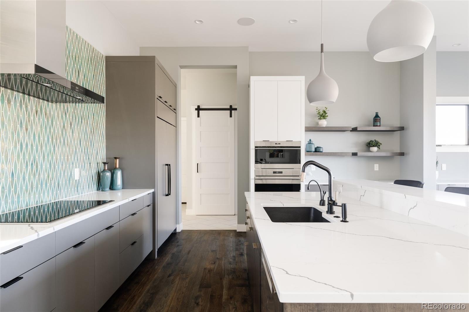 15480 Dinosaur Ridge Road Morrison, CO 80465 - Photo 12 of 50 a kitchen with a sink appliances and cabinets