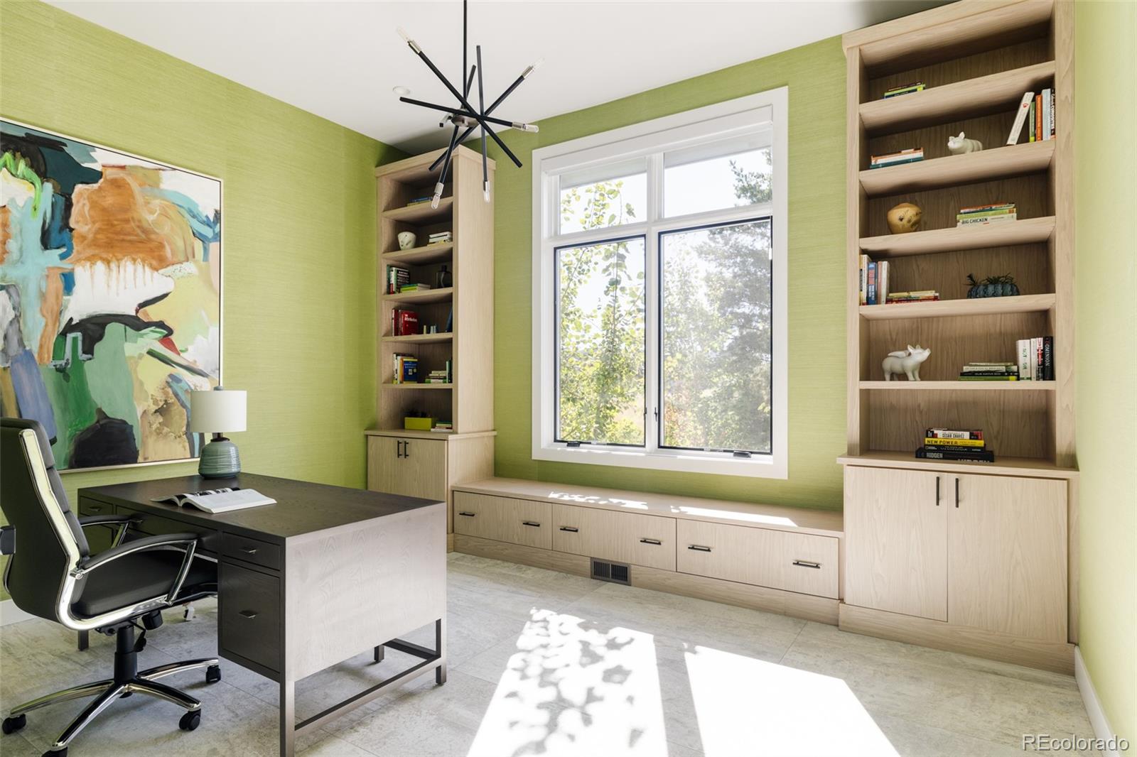 15480 Dinosaur Ridge Road Morrison, CO 80465 - Photo 18 of 50 a workspace with furniture and a window