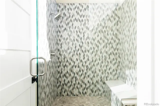 a bathroom with a shower curtain