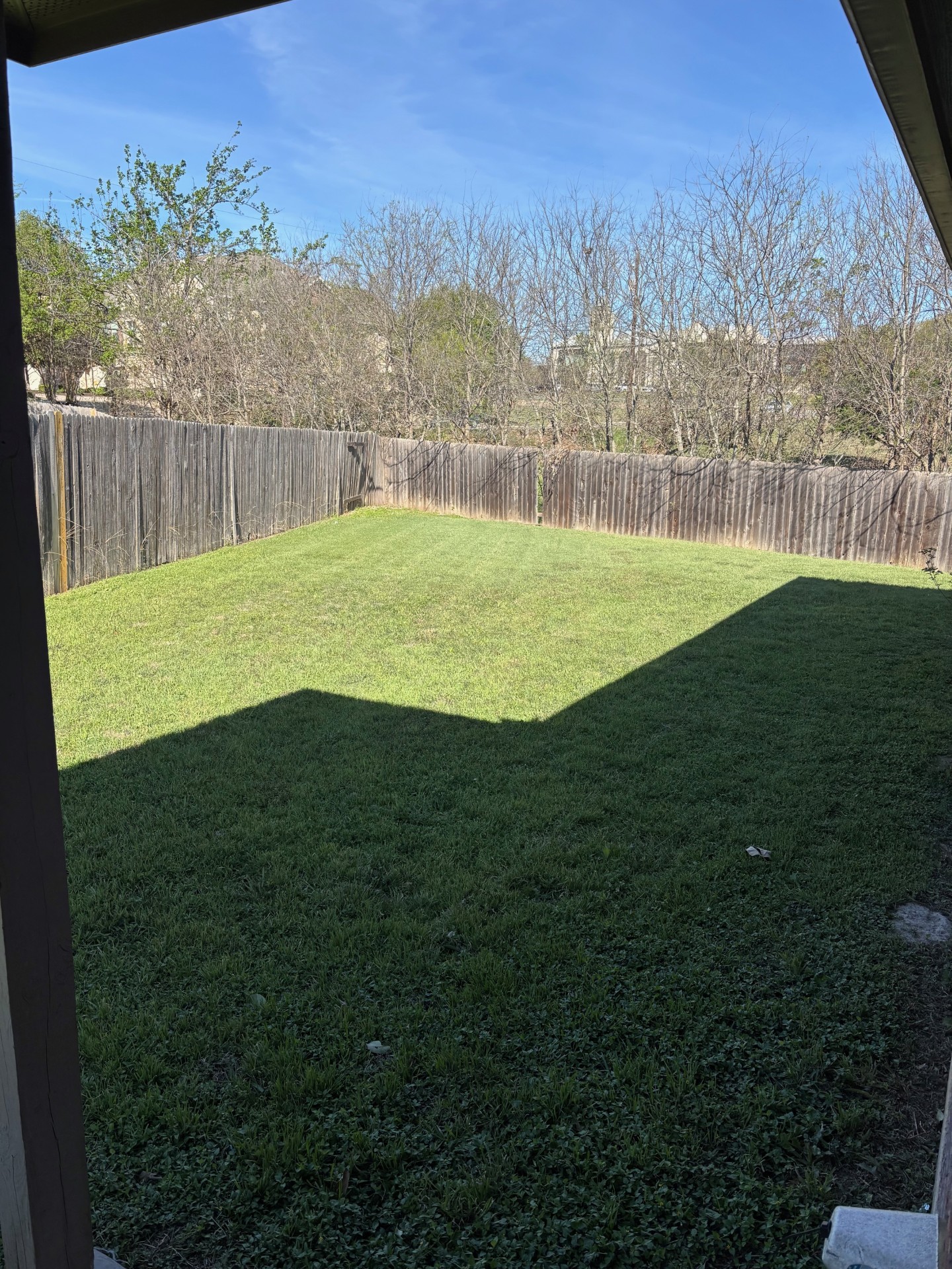 1410 Bergin Court, Unit B Georgetown, TX 78626 - Photo 2 of 13 a view of a golf course with a garden