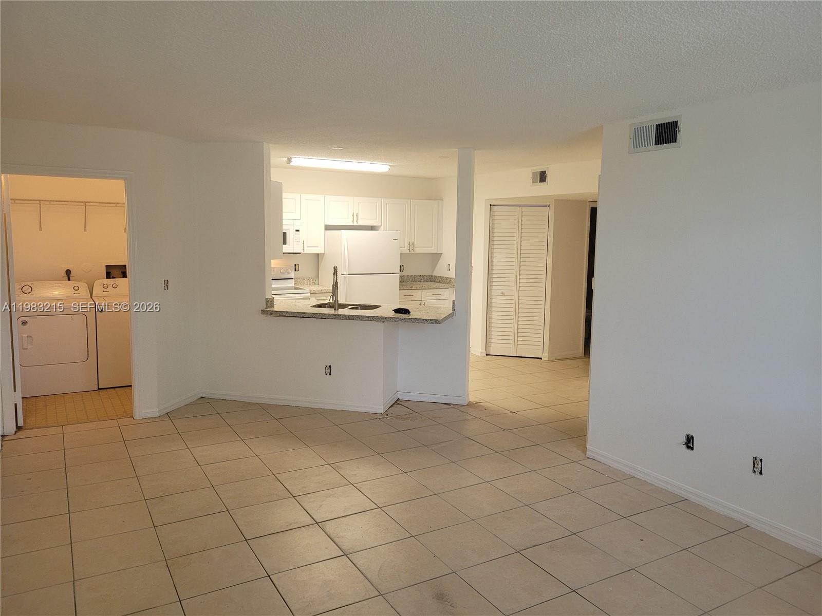 4035 West McNab Road, Unit F103 Pompano Beach, FL 33069 - Photo 24 of 32 LIVING ROOM,