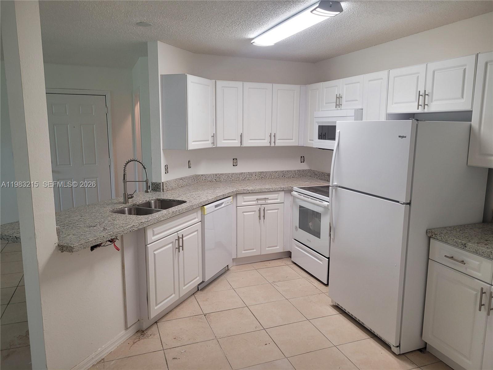 4035 West McNab Road, Unit F103 Pompano Beach, FL 33069 - Photo 3 of 32