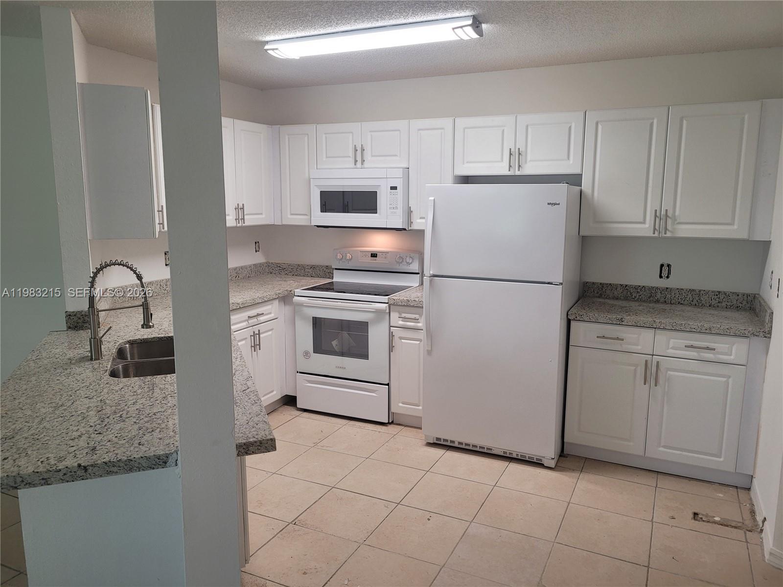4035 West McNab Road, Unit F103 Pompano Beach, FL 33069 - Photo 4 of 32