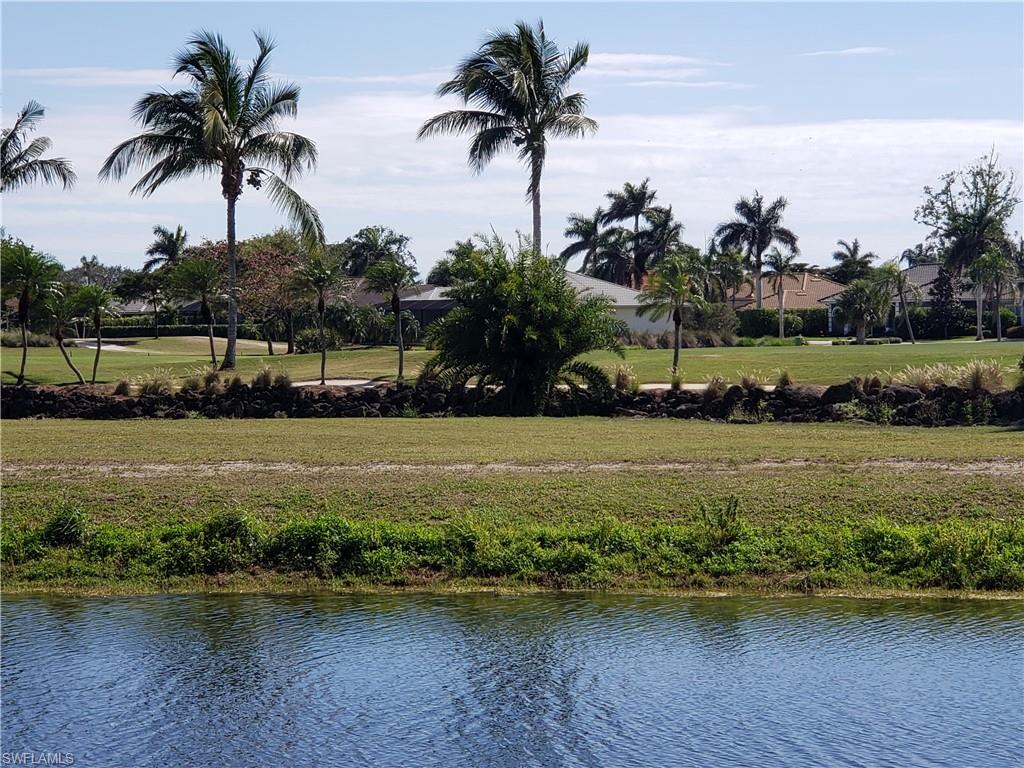 a view of a lake with a house