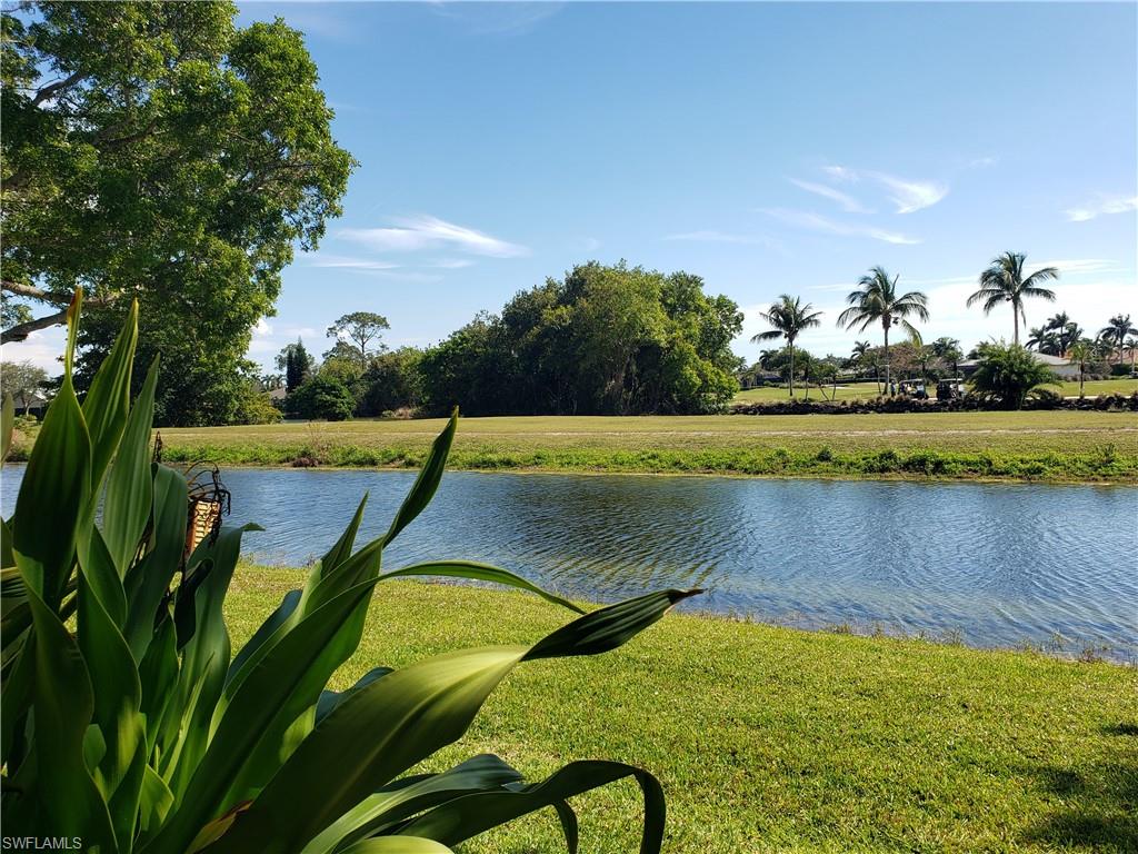 5435 Rattlesnake Hammock Road, Unit E102 Naples, FL 34113 - Photo 25 of 32 a view of swimming pool