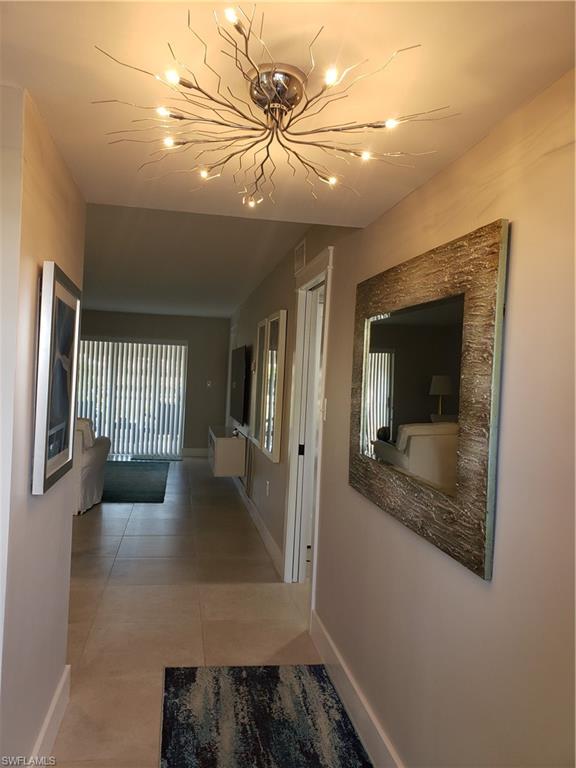 5435 Rattlesnake Hammock Road, Unit E102 Naples, FL 34113 - Photo 5 of 32 a view of livingroom with furniture