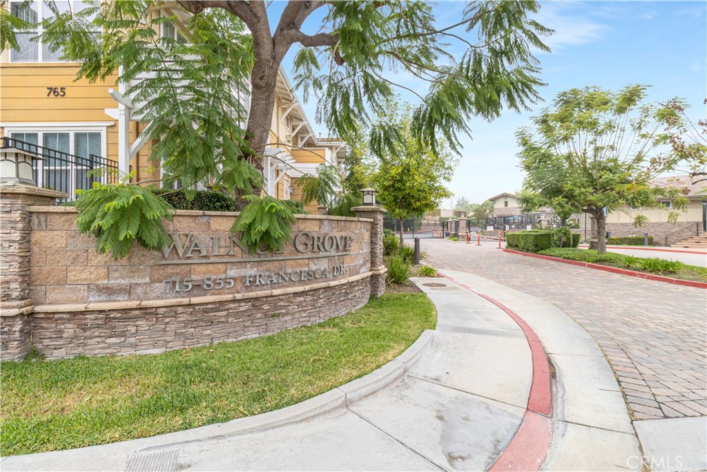 755 Francesca Drive, Unit 201 Walnut, CA 91789 - Photo 1 of 28 a view of a garden with a slide