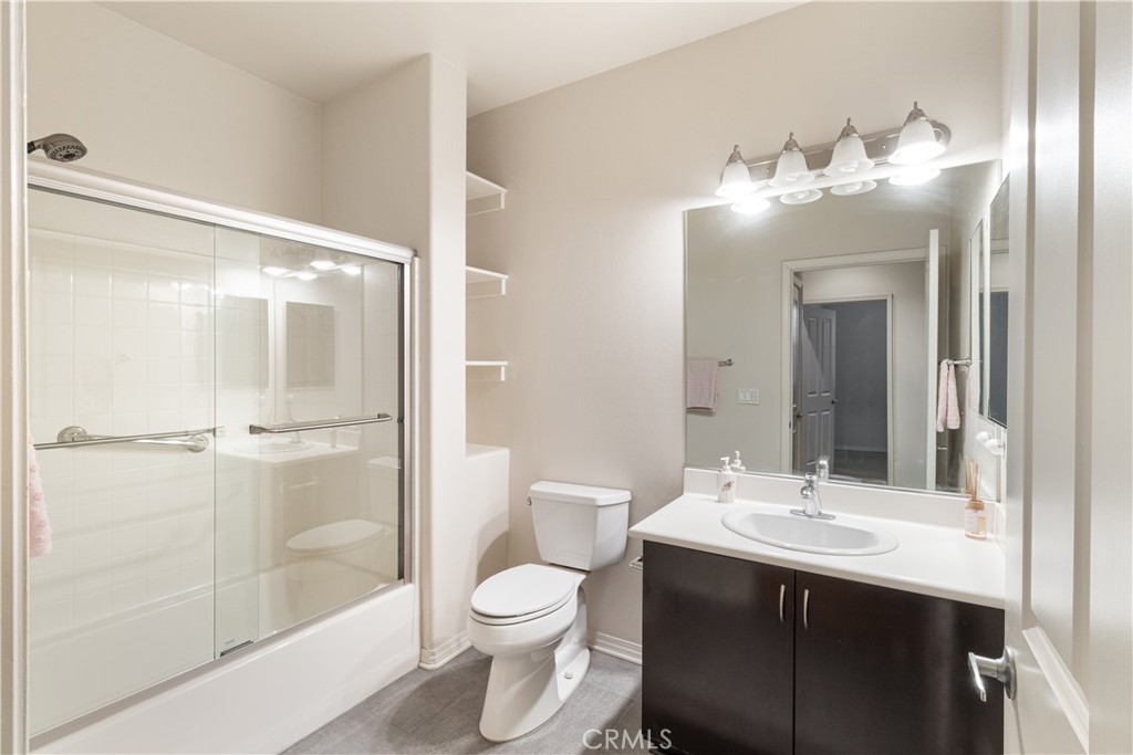 755 Francesca Drive, Unit 201 Walnut, CA 91789 - Photo 12 of 28 a bathroom with a sink vanity mirror and toilet