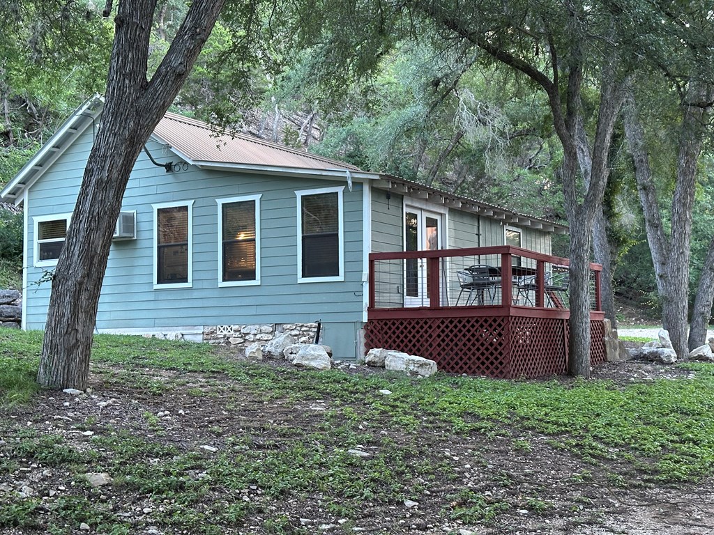 290 Cardinal Hill Road Ingram, TX 78025 - Photo 36 of 57 a front view of a house with garden
