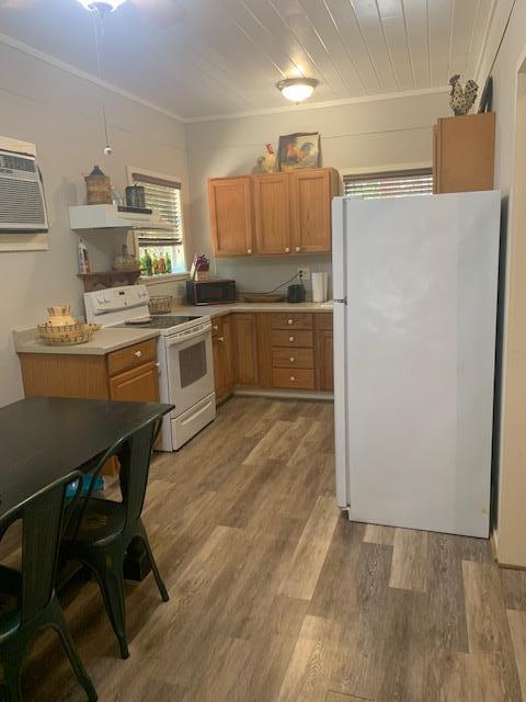 290 Cardinal Hill Road Ingram, TX 78025 - Photo 39 of 57 a kitchen with stainless steel appliances a refrigerator and a stove top oven