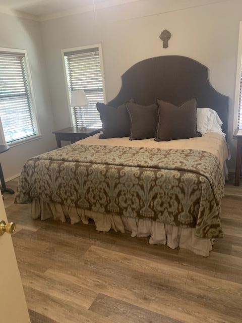 290 Cardinal Hill Road Ingram, TX 78025 - Photo 41 of 57 a bedroom with a bed and a window