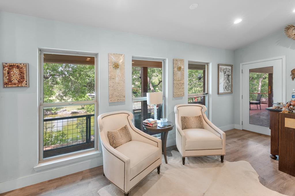 290 Cardinal Hill Road Ingram, TX 78025 - Photo 8 of 57 a living room with furniture and a window