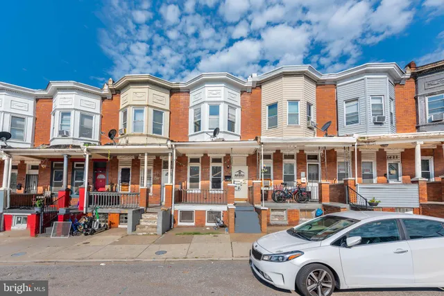 a front view of a building with street view