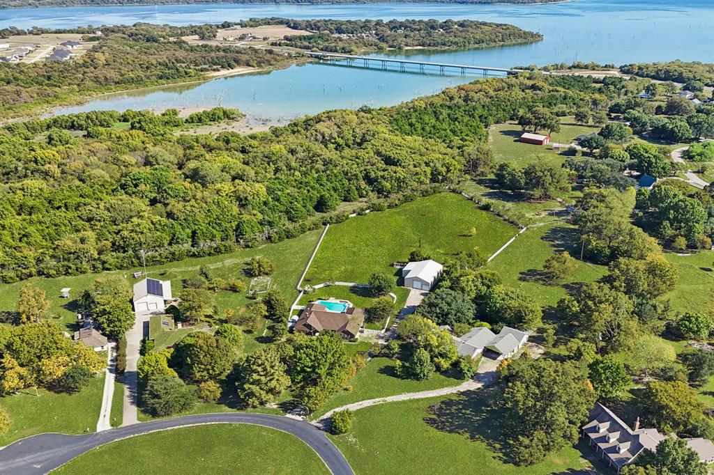 6 North Star Road Lucas, TX 75002 - Photo 1 of 11 a view of a lake with a city